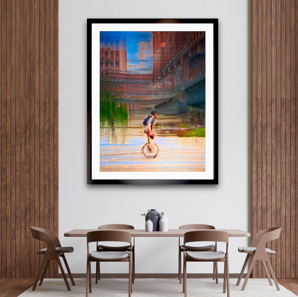 Circus Life person cycling on a unicycle  past Oslo Rådhus Oslo city on there daily commute — ICM photography cycling wall art print by Douglas Carr at Oslo Art Prints. Free worldwide shipping.
