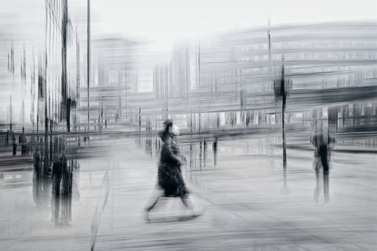 Blurred Intentions a person walking down Karl Johan in Oslo city towards Oslo train station  — Black & White ICM photography cycling wall art print by Douglas Carr at Oslo Art Prints